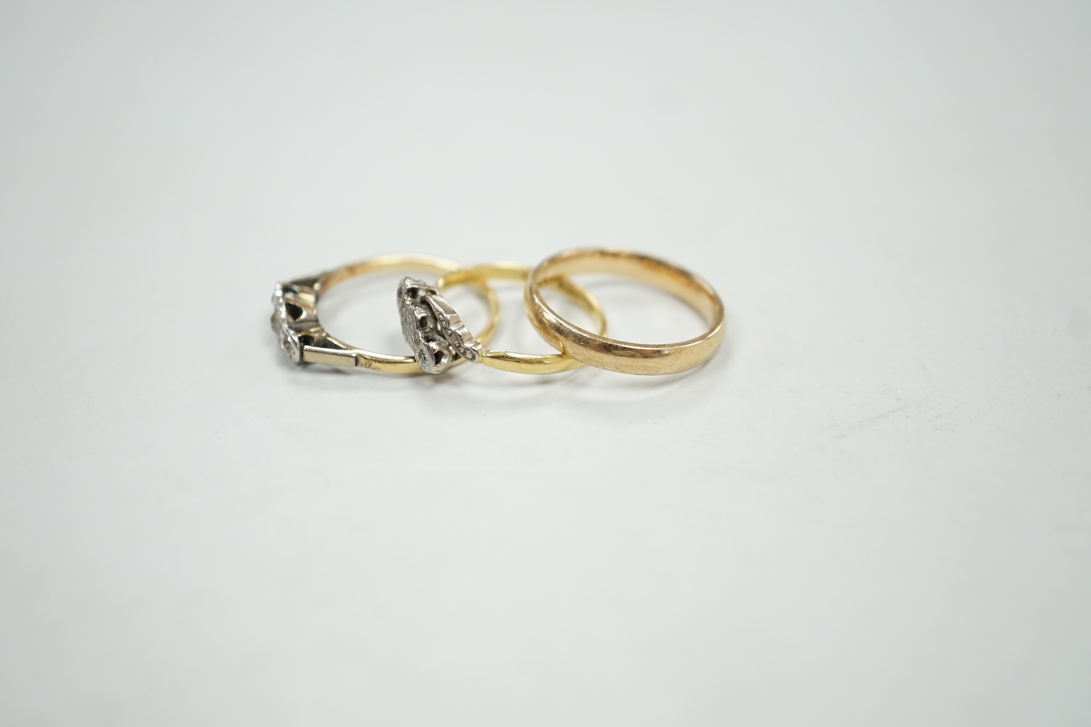 A 9ct gold wedding band, size O/P, 3 grams and two 1940's 18ct and illusion set diamond chip rings, gross 4.4 grams.